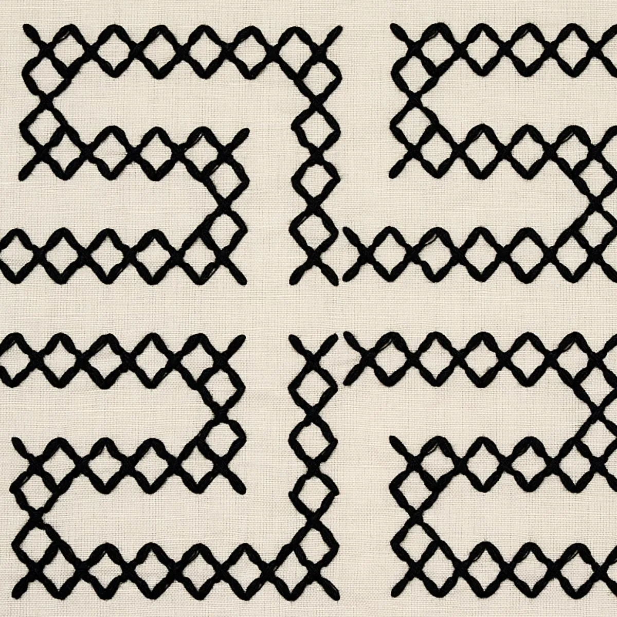 Schumacher 70230 A Maze Embroidery Black On Ivory fabric swatch