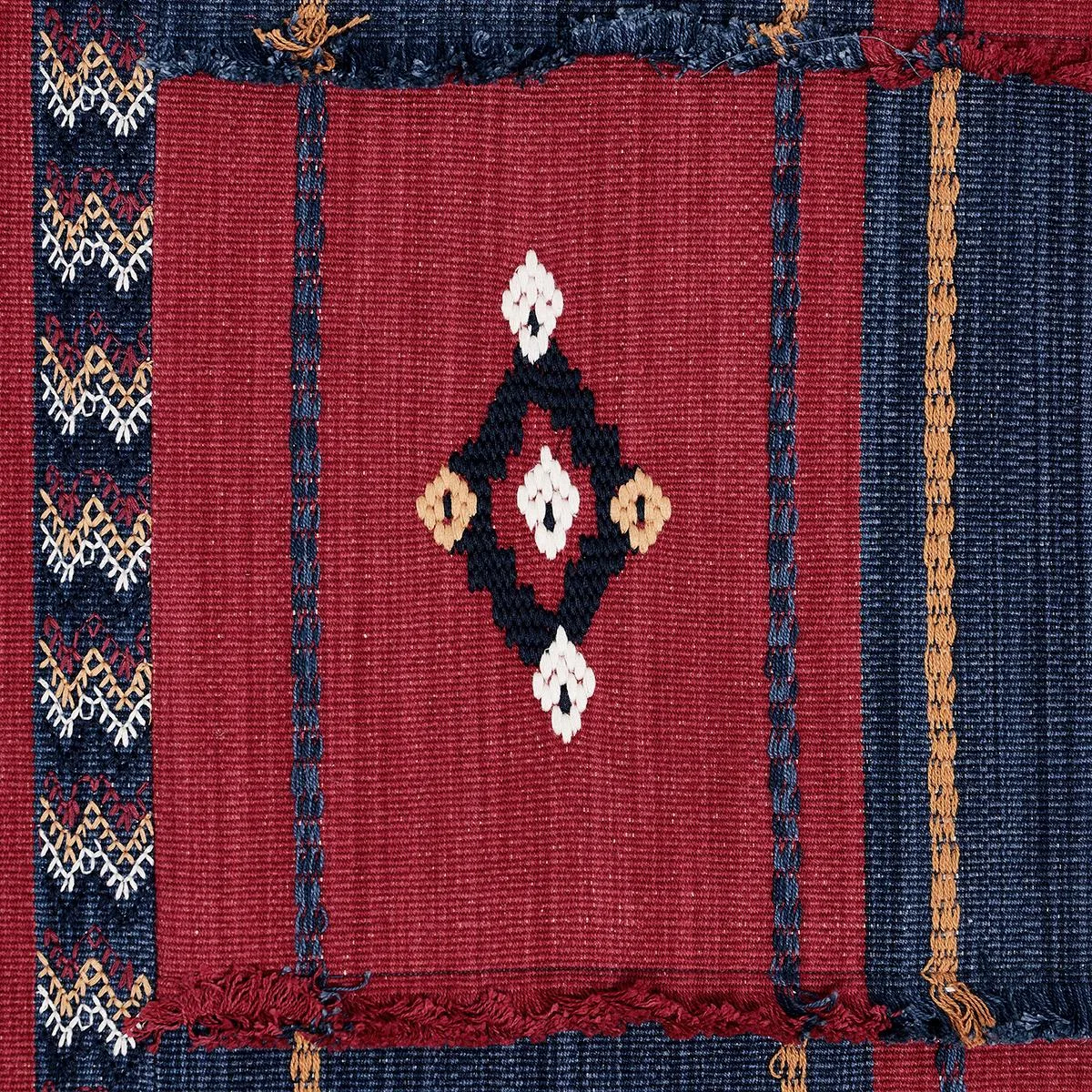 Schumacher 82091 Aravali Patchwork Cerise And Ink fabric swatch