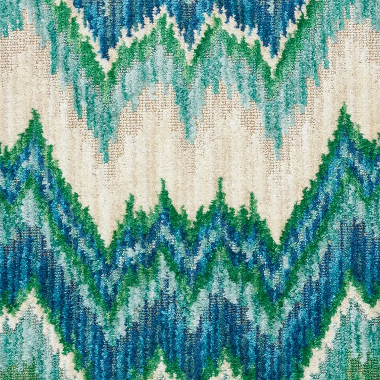 Schumacher 78791 Bezique Flamestitch Velvet Blue & Green fabric swatch