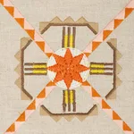 Schumacher 77602 Chamizal Embroidery Orange & Pink fabric swatch