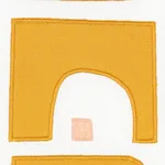 Schumacher 82033 Den Appliqué Ochre fabric swatch