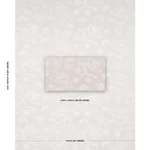 Schumacher 81551 Dragon Embroidery Ivory On Natural fabric swatch