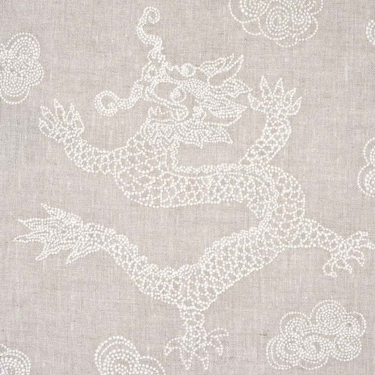 Schumacher 81551 Dragon Embroidery Ivory On Natural fabric swatch