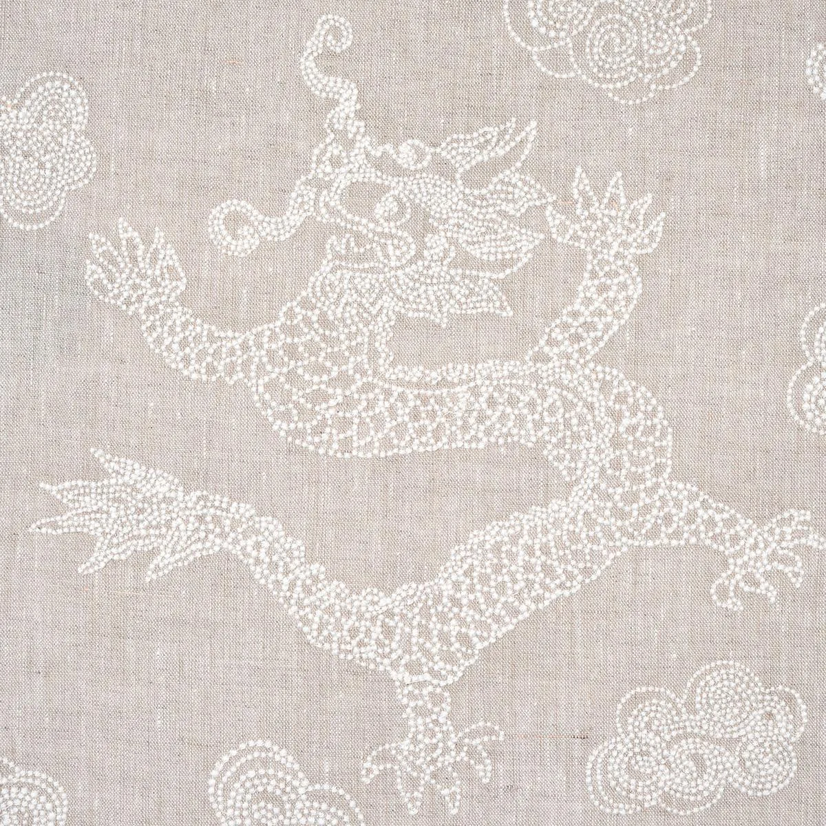 Schumacher 81551 Dragon Embroidery Ivory On Natural fabric swatch