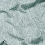 Schumacher 85931 Gracie Solid Strié Mint Green fabric swatch