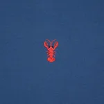 Schumacher 78800 Lobster Embroidery Navy fabric swatch