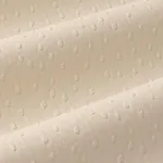 Schumacher 87281 Ostrich Vegan Leather Cream fabric swatch