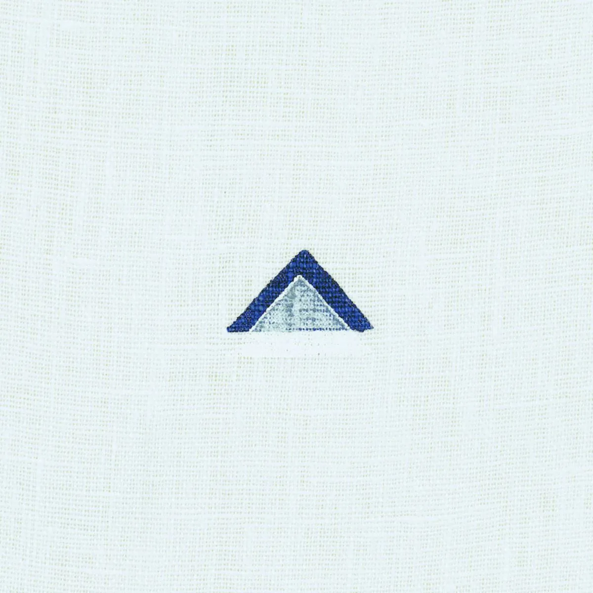 Schumacher 74021 Overlapping Triangles Hand Print Navy & White fabric swatch