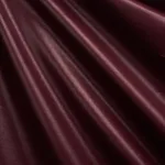 Schumacher 85272 Patent Linen Plum fabric swatch