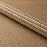Schumacher 83301 Petite Channeled Velvet Camel fabric swatch