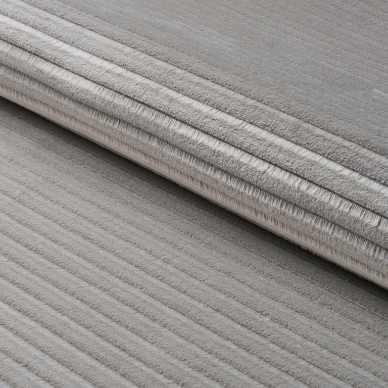 Schumacher 83302 Petite Channeled Velvet Otter Grey fabric swatch