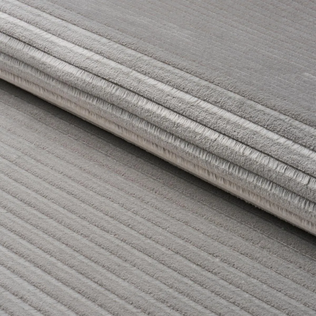 Schumacher 83302 Petite Channeled Velvet Otter Grey fabric swatch
