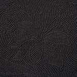 Schumacher 81591 Quilted Scroll Matelassé Pitch Black fabric swatch