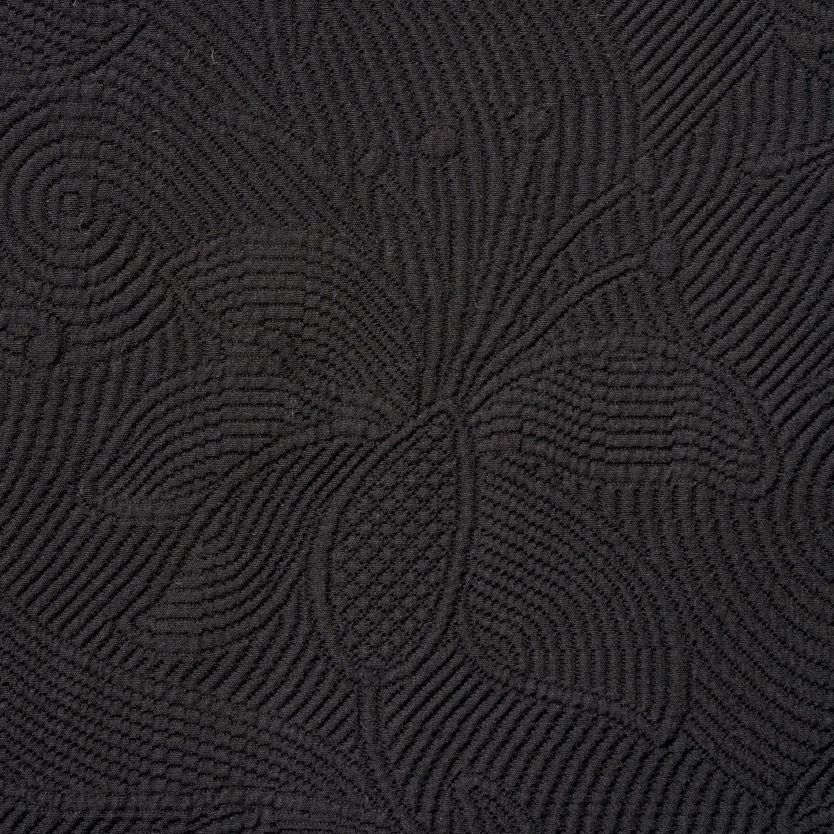 Schumacher 81591 Quilted Scroll Matelassé Pitch Black fabric swatch