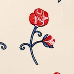 Schumacher 84550 Rhinestone Cowboy Embroidery Poppy fabric swatch