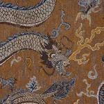 Schumacher 85091 Serpentine Dragon Brown & Blue fabric swatch