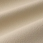 Schumacher 87301 Textured Vegan Leather Cream fabric swatch