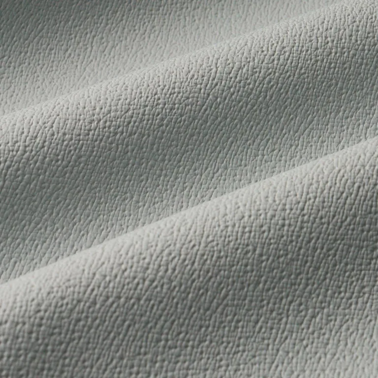 Schumacher 87302 Textured Vegan Leather Fog fabric swatch