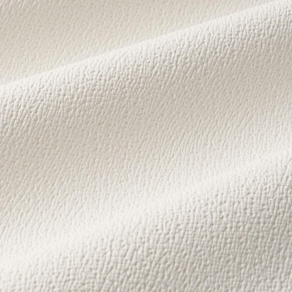 Schumacher 87300 Textured Vegan Leather Ivory fabric swatch