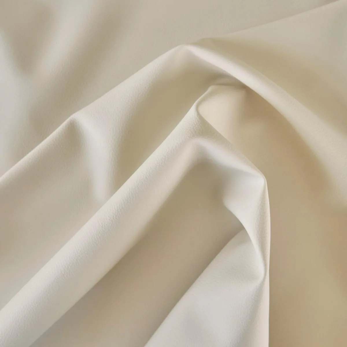 Schumacher 79552 Vegan Leather Indoor/Outdoor Cream fabric swatch