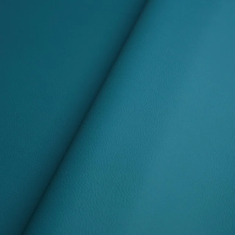 Schumacher 80908 Vegan Leather Indoor/Outdoor Peacock fabric swatch