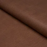Schumacher 87804 Vegan Leather Rattan Indoor/Outdoor Chocolate fabric swatch