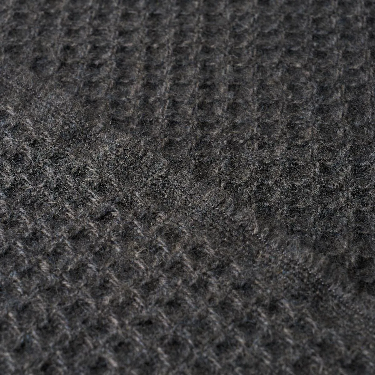 Schumacher 82642 Walden Wool Texture Charcoal fabric swatch