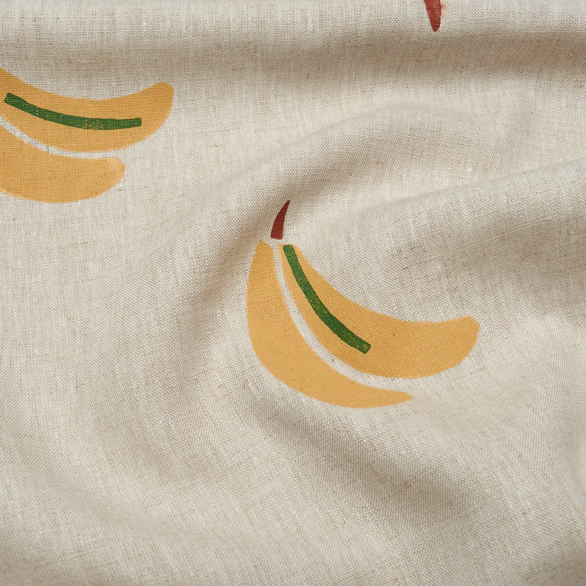 BANANA STAND HAND BLOCK PRINT fabric OCHRE AND GREEN ON NATURAL color by Schumacher