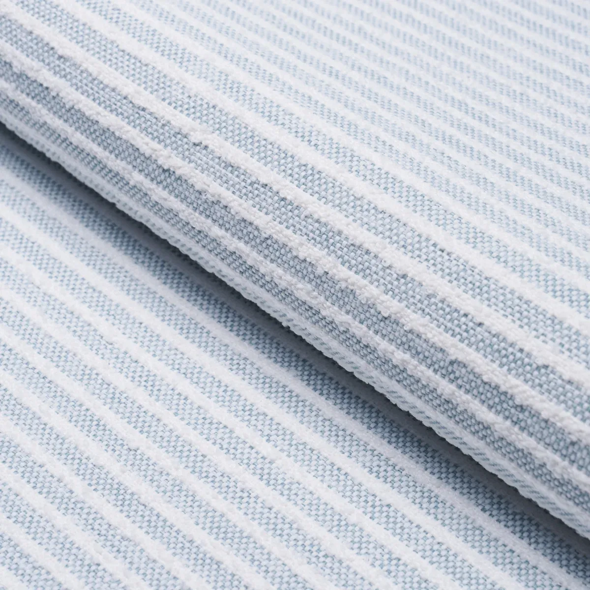 BOUCLÉ STRIPE INDOOR/OUTDOOR fabric CHAMBRAY color by Schumacher