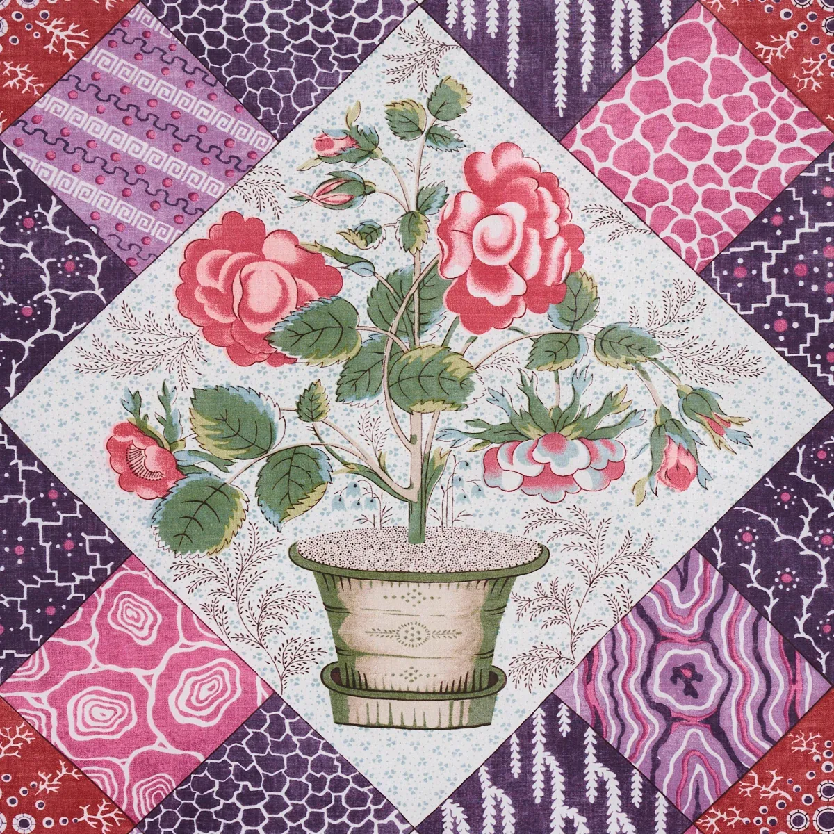 CALDWELL PATCHWORK CHINTZ fabric FUCHSIA AND PLUM color by Schumacher