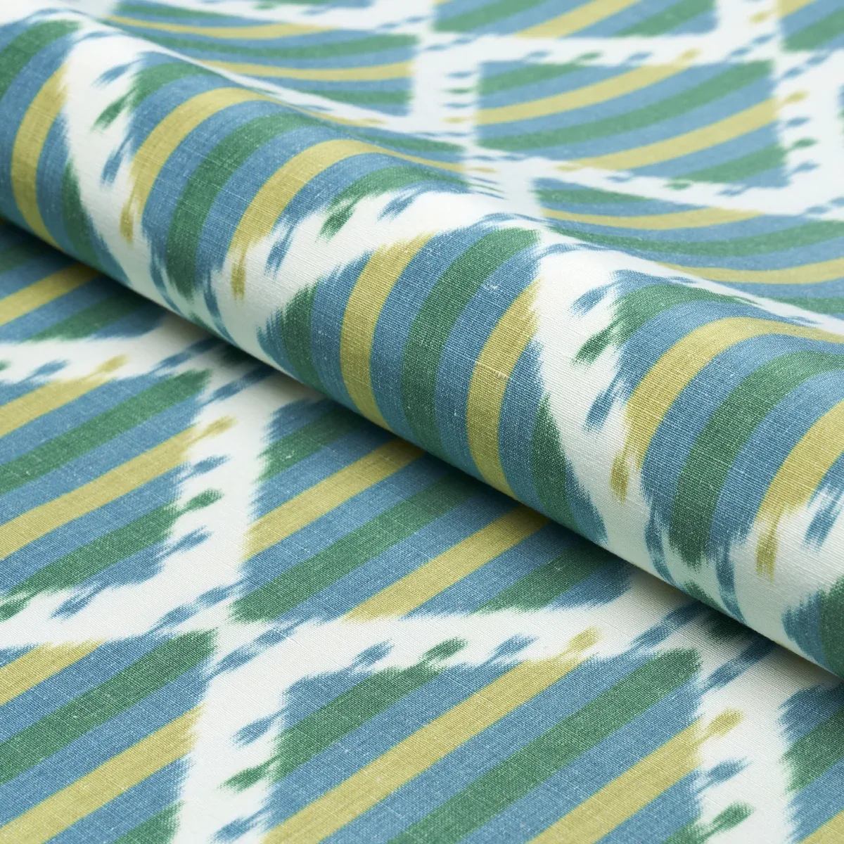 KAI STRIPED IKAT fabric GREEN color by Schumacher