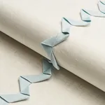 LAZARE APPLIQUÉ Fabric – SKY ON IVORY | Schumacher | Wallpap LAZARE APPLIQUÉ fabric SKY ON IVORY color by Schumacher