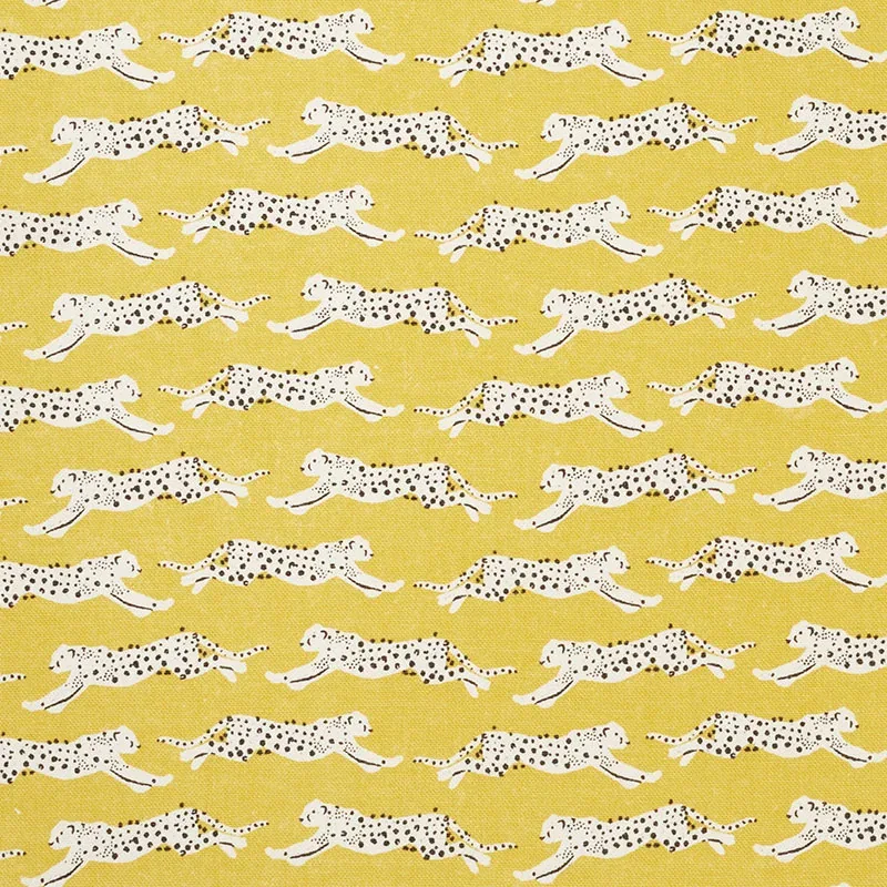 LEAPING LEOPARDS fabric YELLOW color by Schumacher