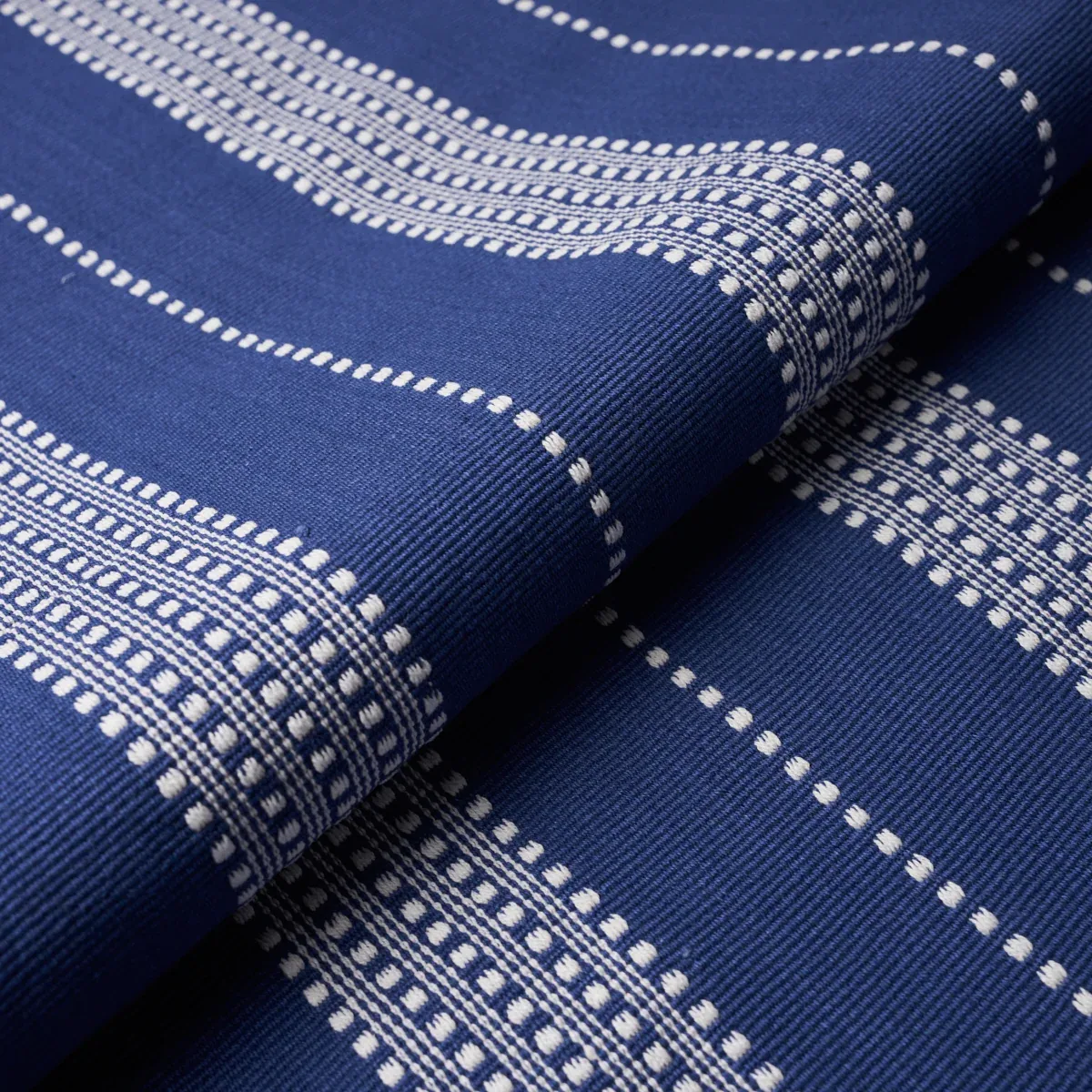 LUBECK STRIPE Fabric – IVORY ON BLUE | Schumacher | Wallpape LUBECK STRIPE fabric IVORY ON BLUE color by Schumacher