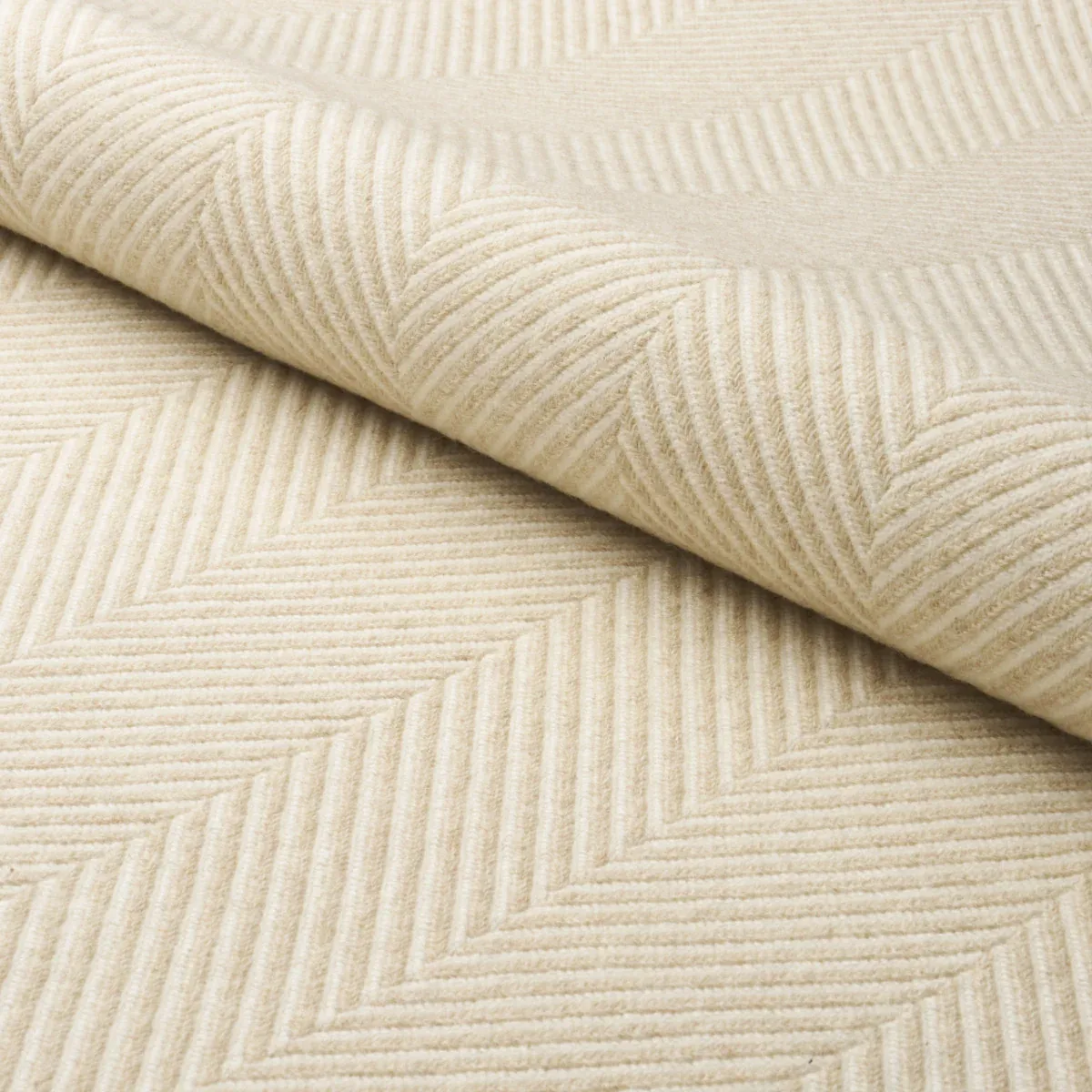 MILO WOOL HERRINGBONE Fabric – NATURAL | Schumacher | Wallpa MILO WOOL HERRINGBONE fabric NATURAL color by Schumacher