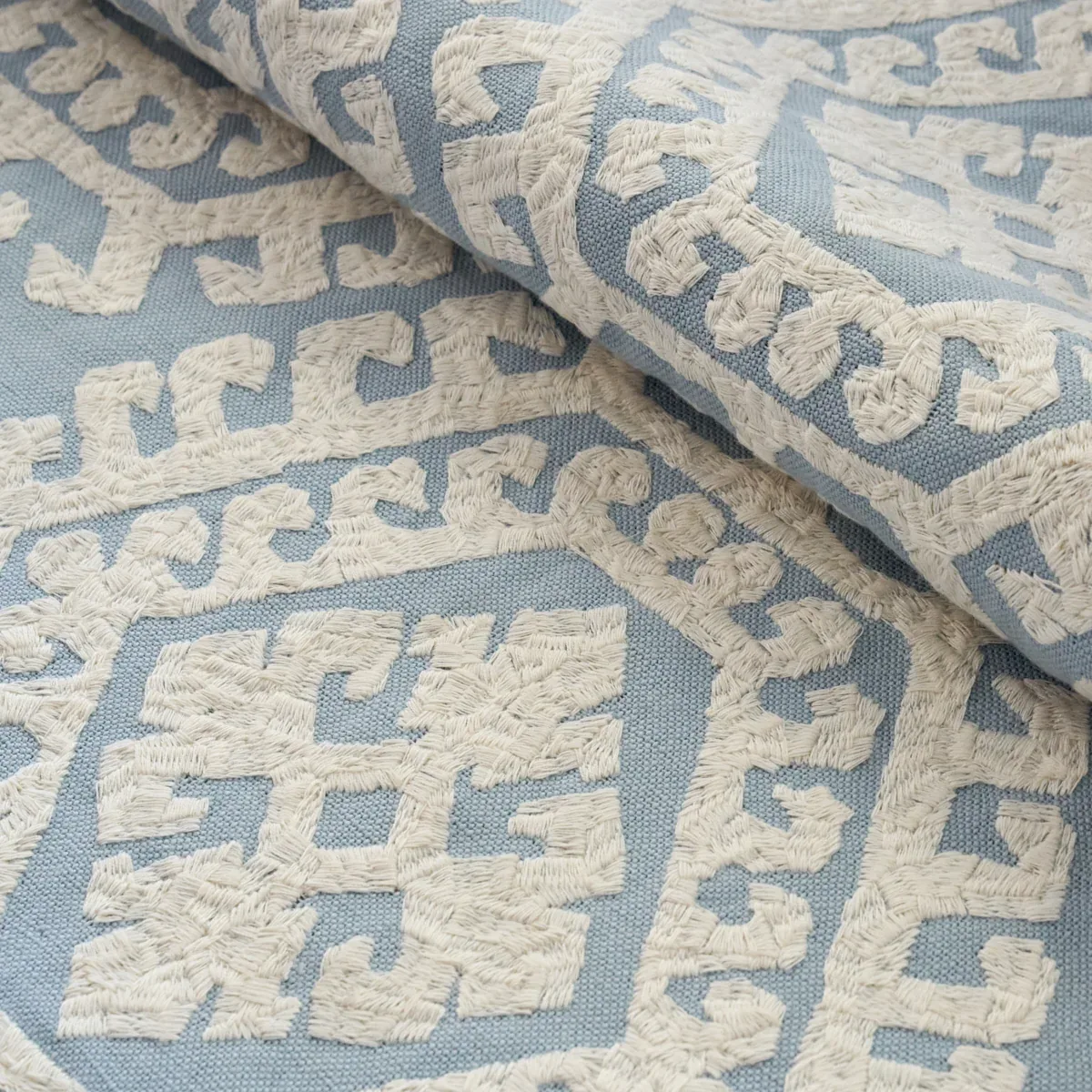 OMAR EMBROIDERY Fabric – SKY | Schumacher | Wallpaper Twins OMAR EMBROIDERY fabric SKY color by Schumacher