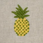 PINEAPPLE EMBROIDERY fabric GREEN ON NATURAL color by Schumacher