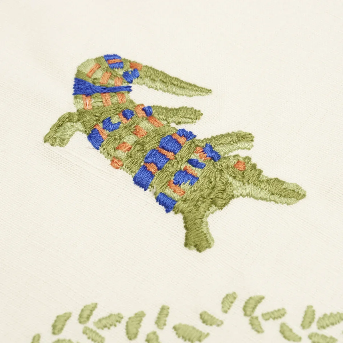 REPTILIA EMBROIDERY fabric BRIGHT MULTI ON IVORY color by Schumacher