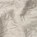 SALON MATELASSÉ SATIN Fabric – LIMESTONE | Schumacher | Wall SALON MATELASSÉ SATIN fabric LIMESTONE color by Schumacher