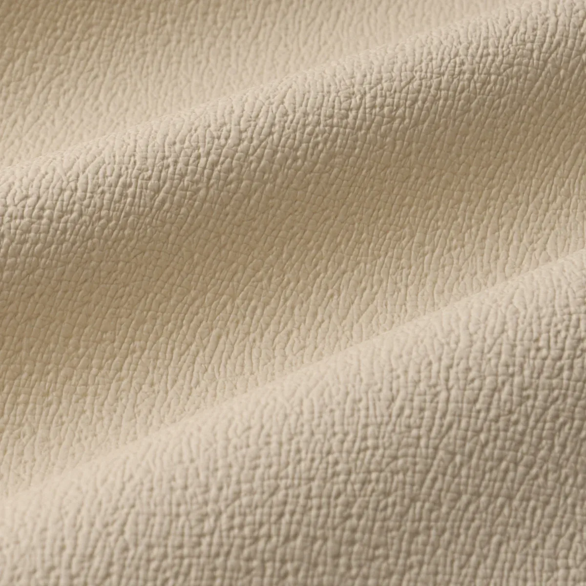TEXTURED VEGAN LEATHER Fabric – CREAM | Schumacher | Wallpap TEXTURED VEGAN LEATHER fabric CREAM color by Schumacher
