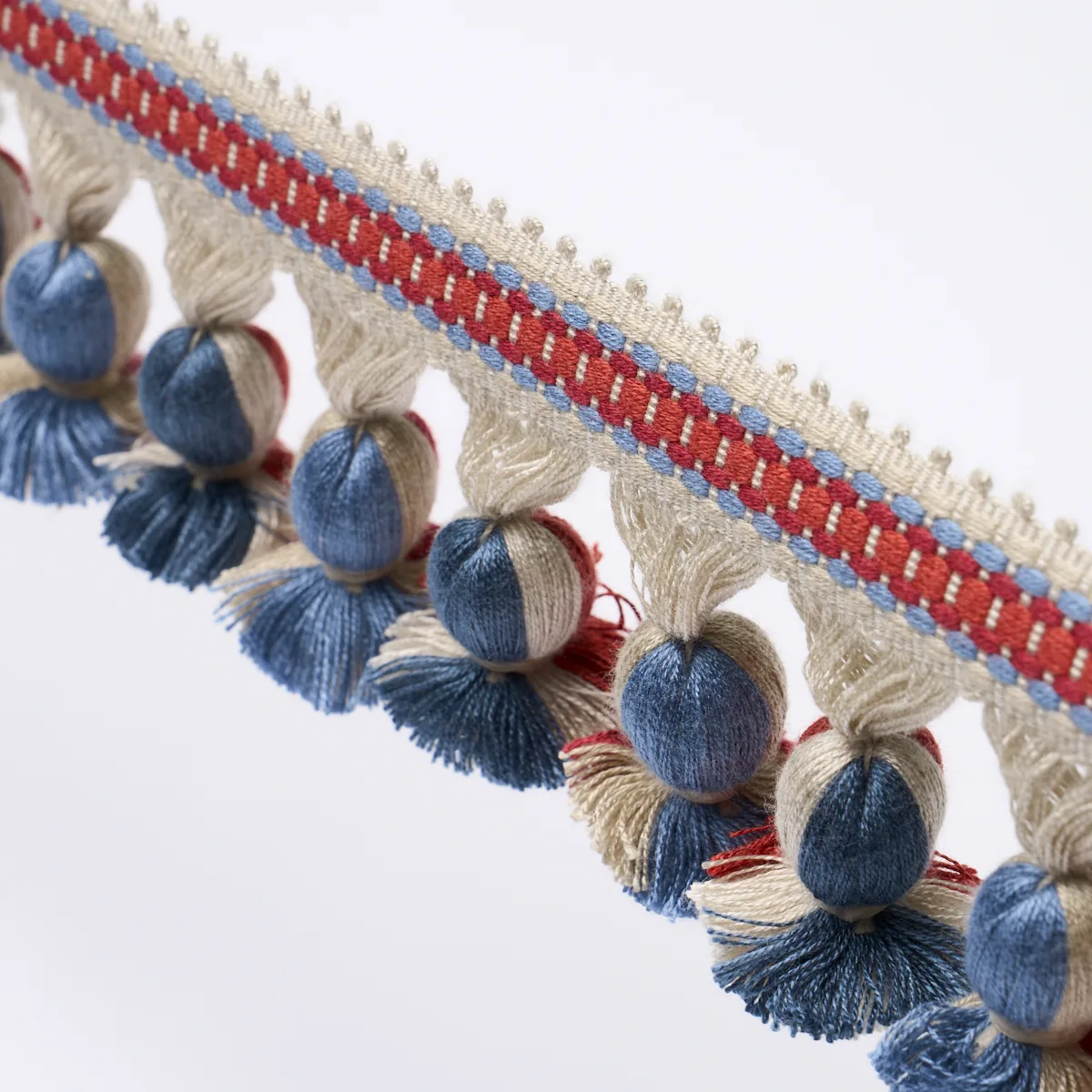 84673 | Ali Tassel - Rouge & Navy Schumacher Ali Tassel trim in Rouge & Navy (84673)