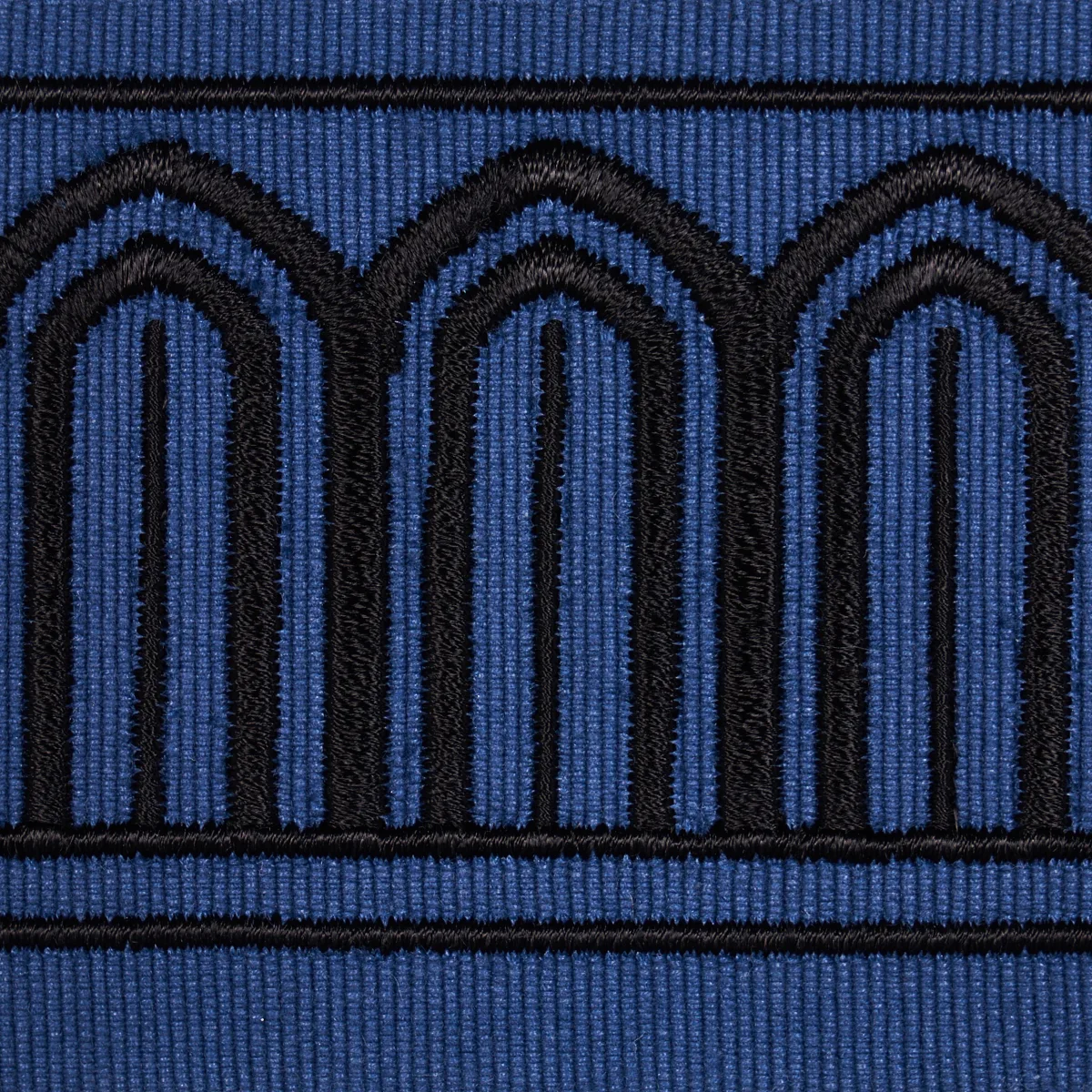 81150 | Arches Embroidered Tape Medium - Black on Navy Schumacher Arches Embroidered Tape Medium trim in Black on Navy (81150)