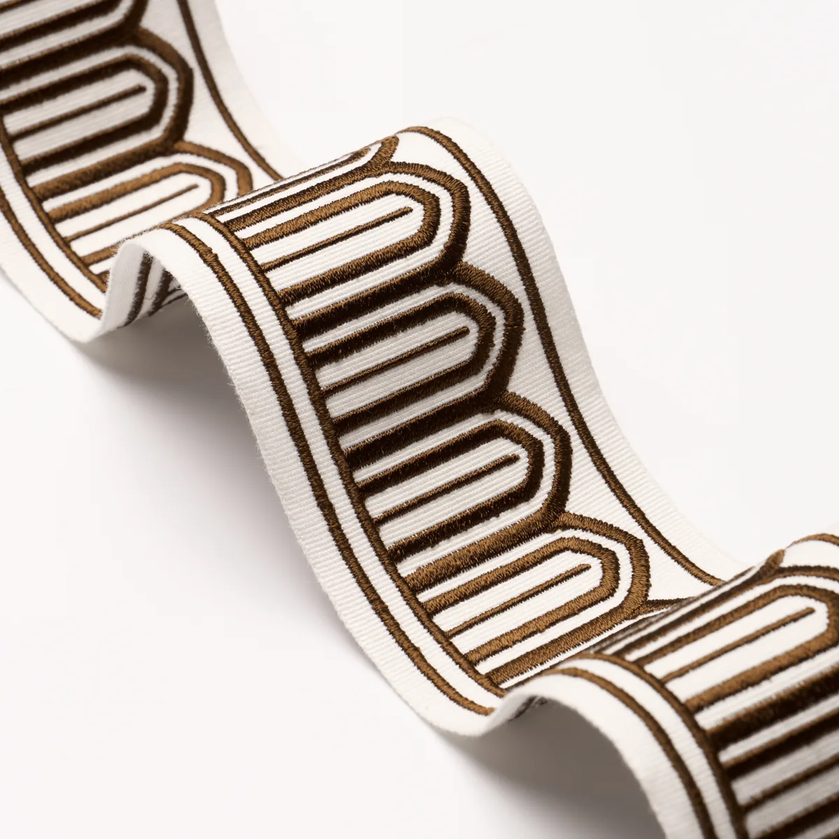 81154 | Arches Embroidered Tape Medium - Brown Schumacher Arches Embroidered Tape Medium trim in Brown (81154)