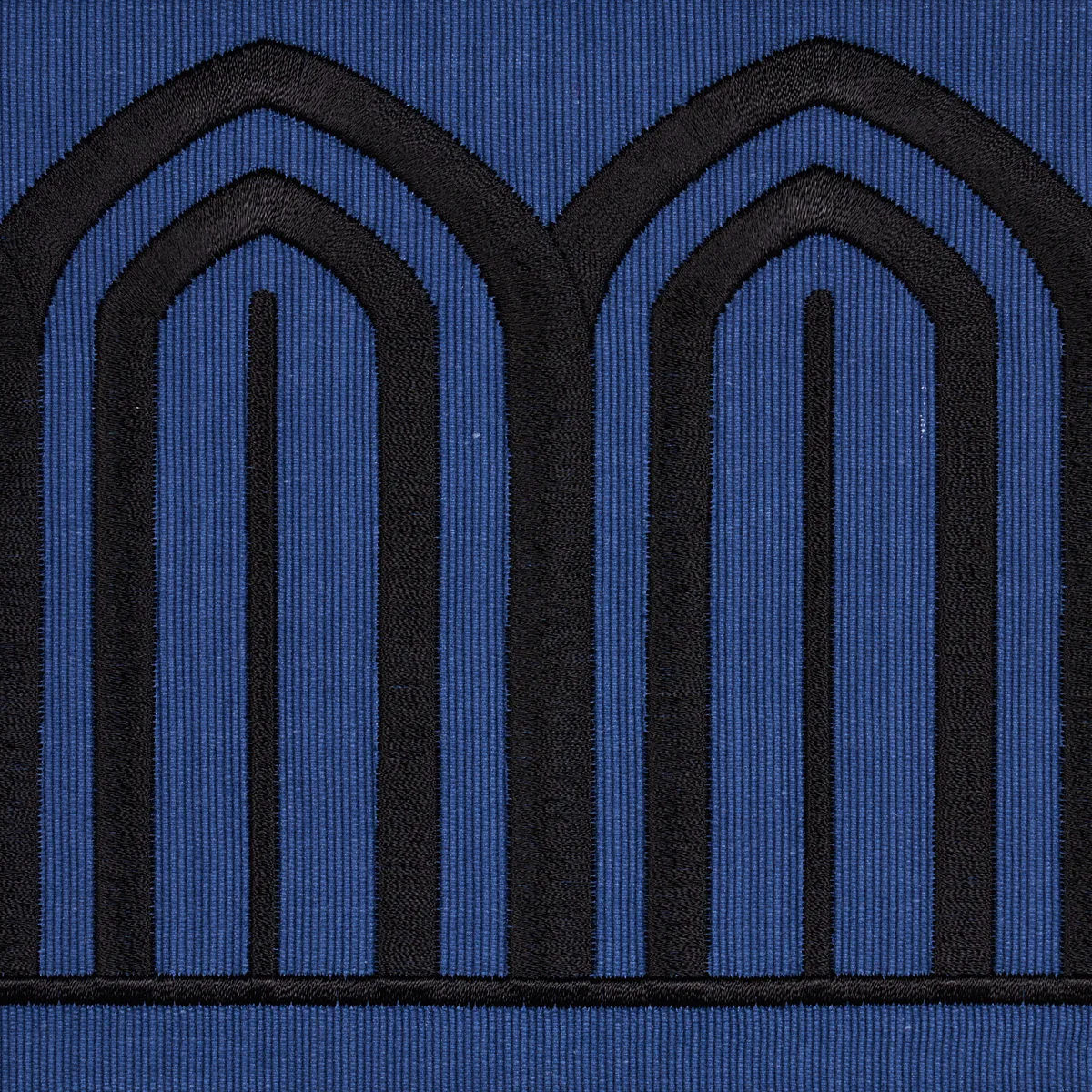 81160 | Arches Embroidered Tape Wide - Black on Navy Schumacher Arches Embroidered Tape Wide trim in Black on Navy (81160)