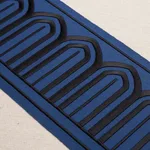 81160 | Arches Embroidered Tape Wide - Black on Navy Schumacher Arches Embroidered Tape Wide trim in Black on Navy (81160)