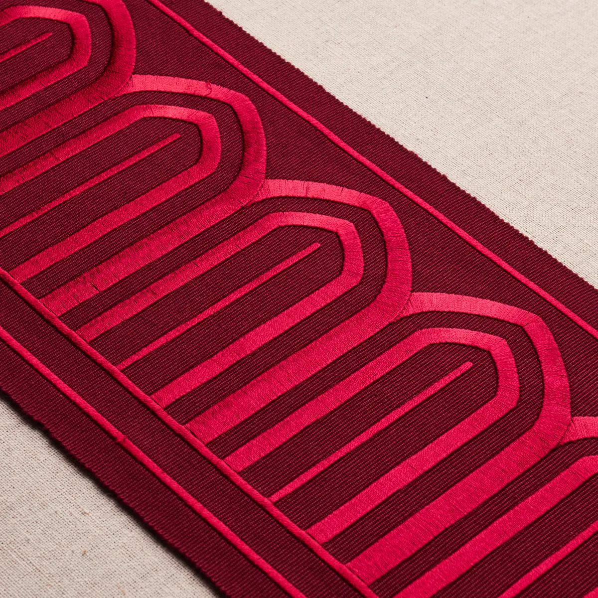 70778 | Arches Embroidered Tape Wide - Red Schumacher Arches Embroidered Tape Wide trim in Red (70778)