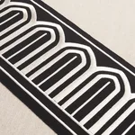 70777 | Arches Embroidered Tape Wide - White on Black Schumacher Arches Embroidered Tape Wide trim in White on Black (70777)