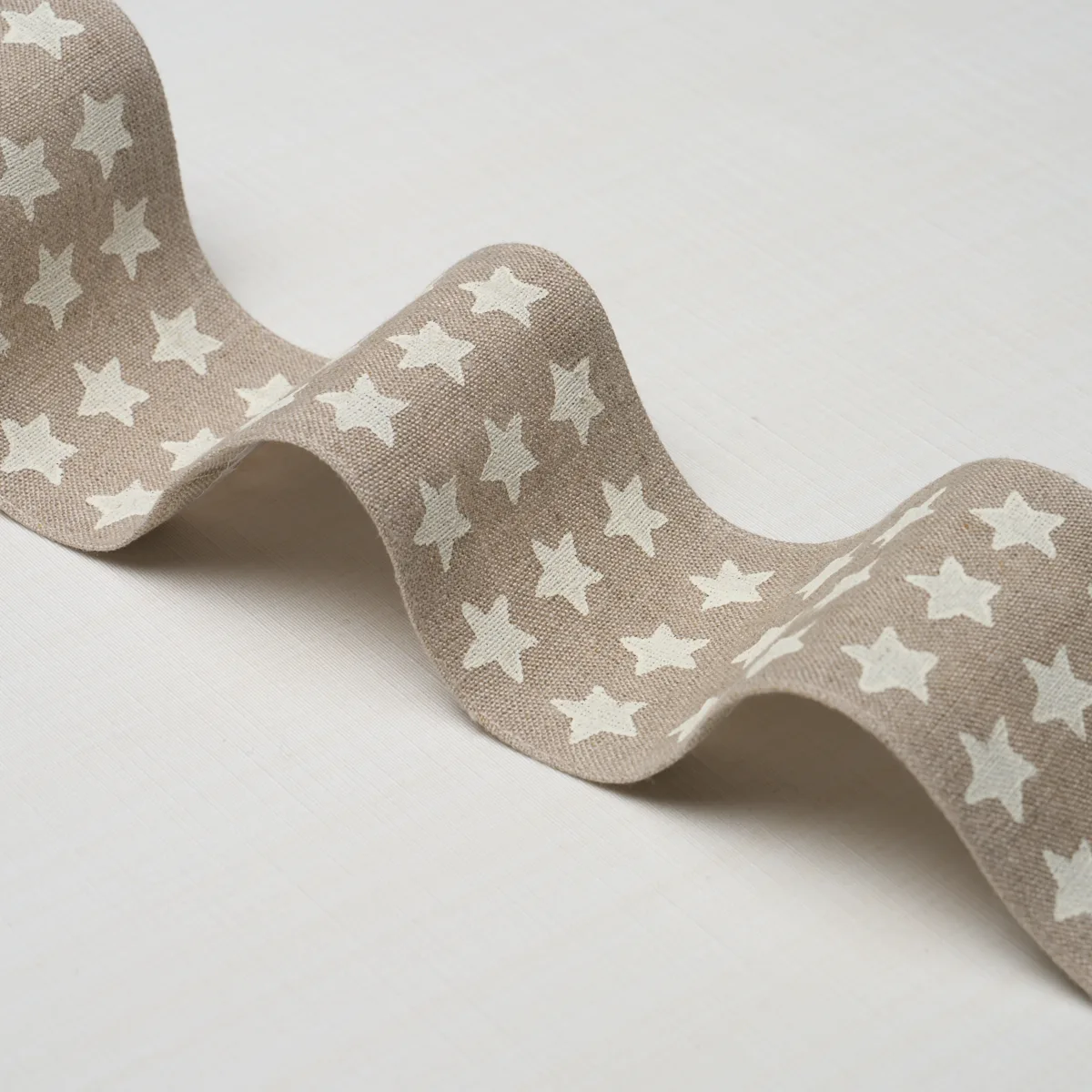 87561 | Astra Block-Print Tape - Neutral Schumacher Astra Block-Print Tape trim in Neutral (87561)