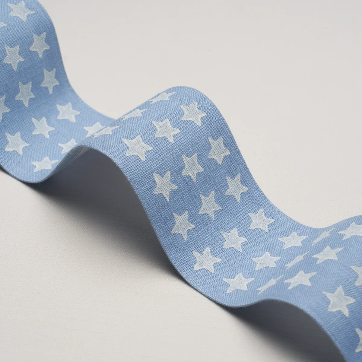 87560 | Astra Block-Print Tape - Sky Schumacher Astra Block-Print Tape trim in Sky (87560)