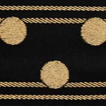82791 | Bianca Tape - Gold Noir Schumacher Bianca Tape trim in Gold Noir (82791)